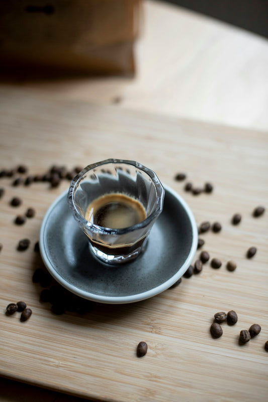 a cup of coffee sitting on top of a saucer