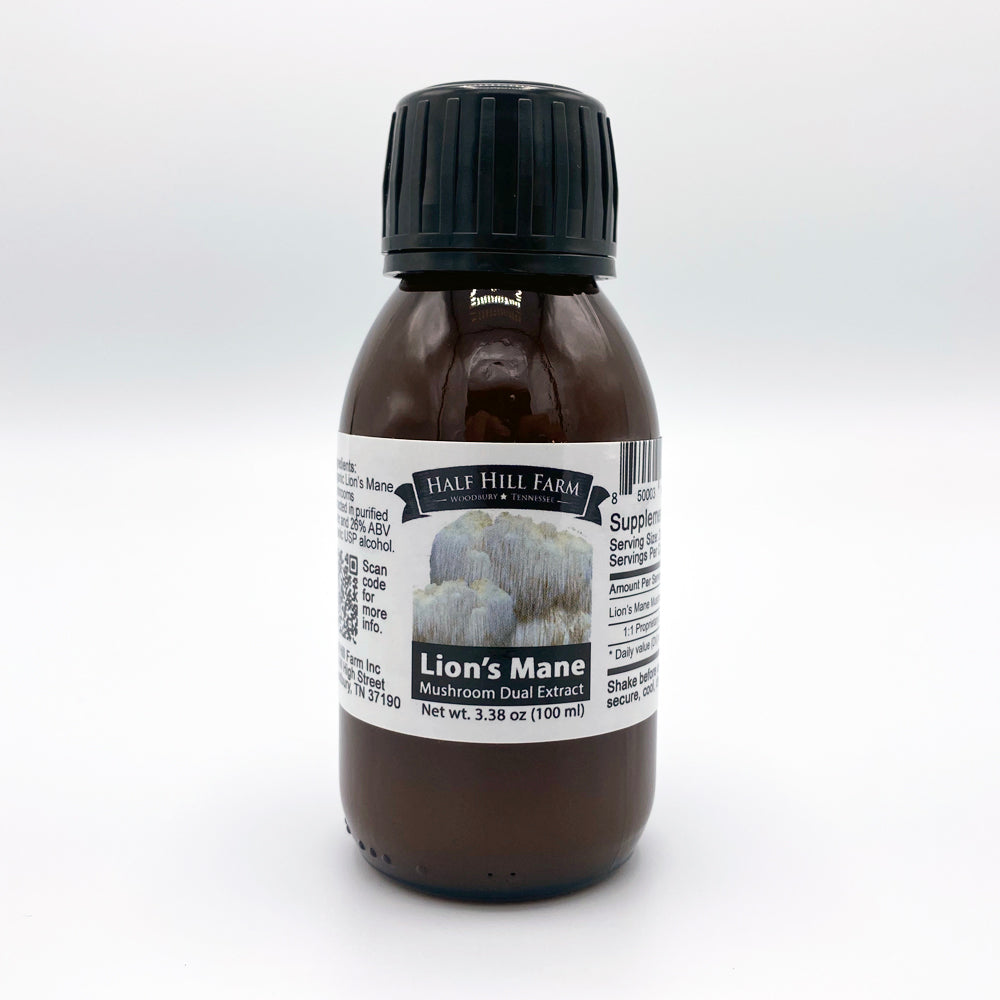 100ml bottle of Half Hill Farm Lion's Mane Mushroom Dual Extract herbal supplement showing the product label.