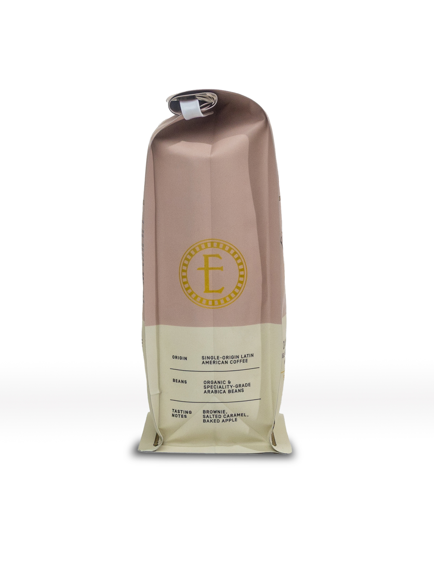 Whole bean coffee from Explorer Cold Brew, showing fresh dark roasted coffee beans in a clear bag.