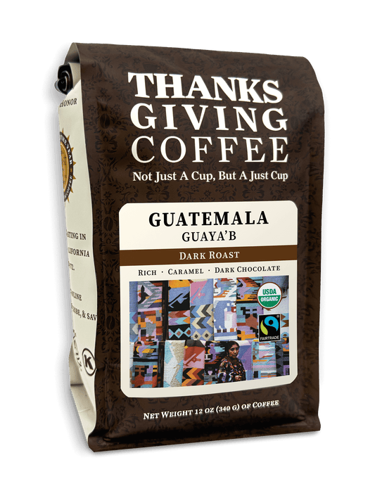 Guatemala FTO Dark Roast coffee bag by Thanksgiving Coffee Company with a dark roast label and 2023 packaging design.