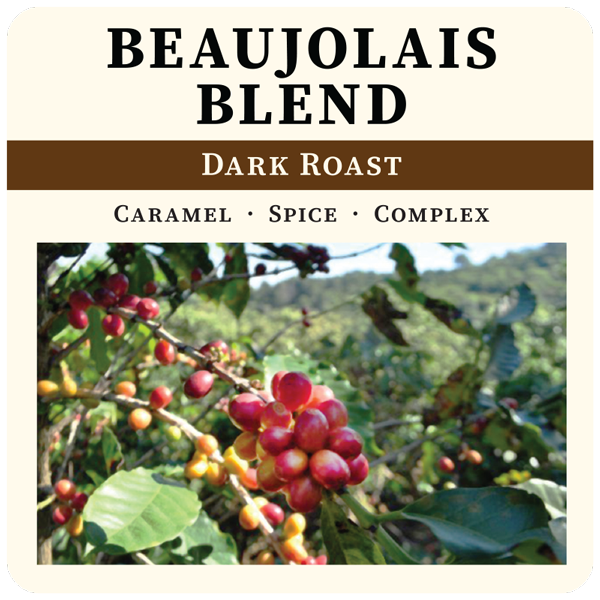 Dark roast Beaujolais Blend coffee bag from Thanksgiving Coffee Company with a colorful label and 2023 branding.