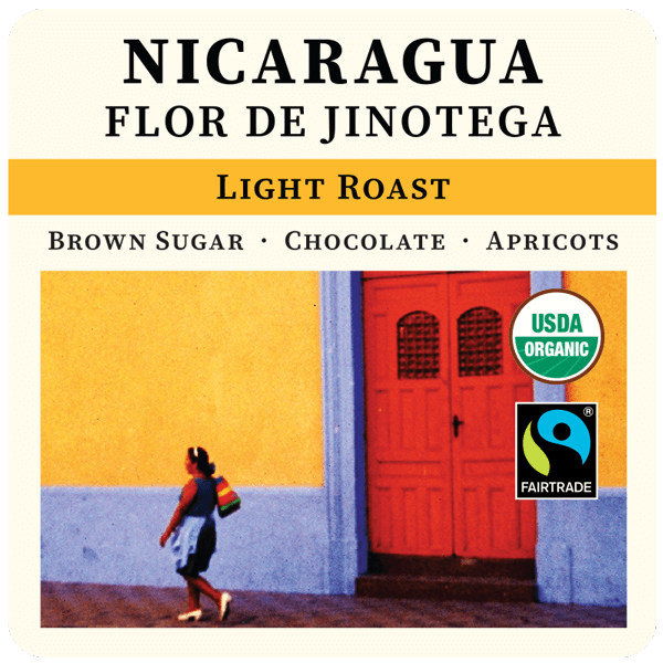 Light roast Nicaragua Flor de Jinotega coffee bag by Thanksgiving Coffee Company with colorful label design.
