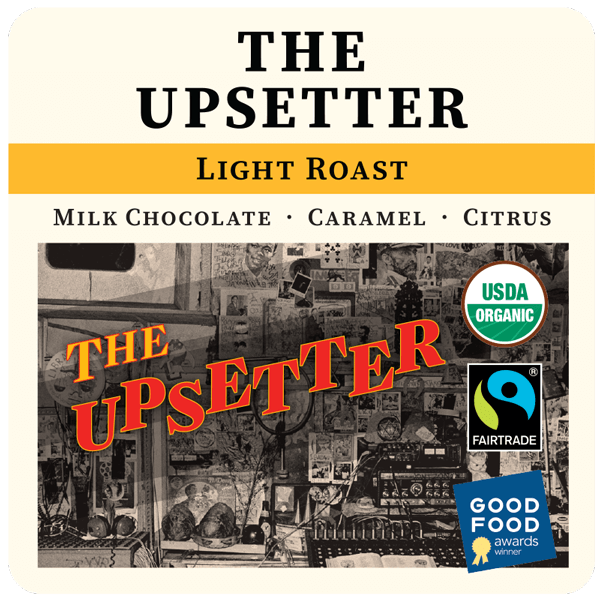 Light roast FTO coffee bag labeled The Upsetter from Thanksgiving Coffee Company, featuring a colorful, artistic label design.