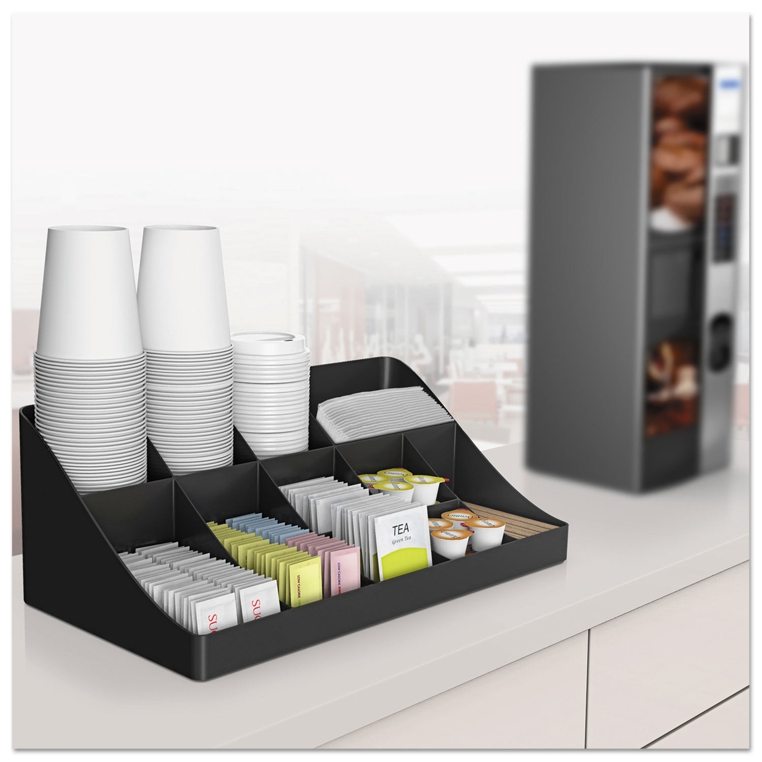 Black Mind Reader 11-compartment coffee condiment station with utensils and condiments, measuring 18.25 x 6.63 x 9.78 inches.