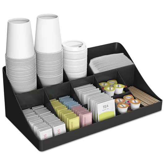 Black Mind Reader 11-compartment coffee condiment station with utensils, spoons, and sugar packets on a countertop.