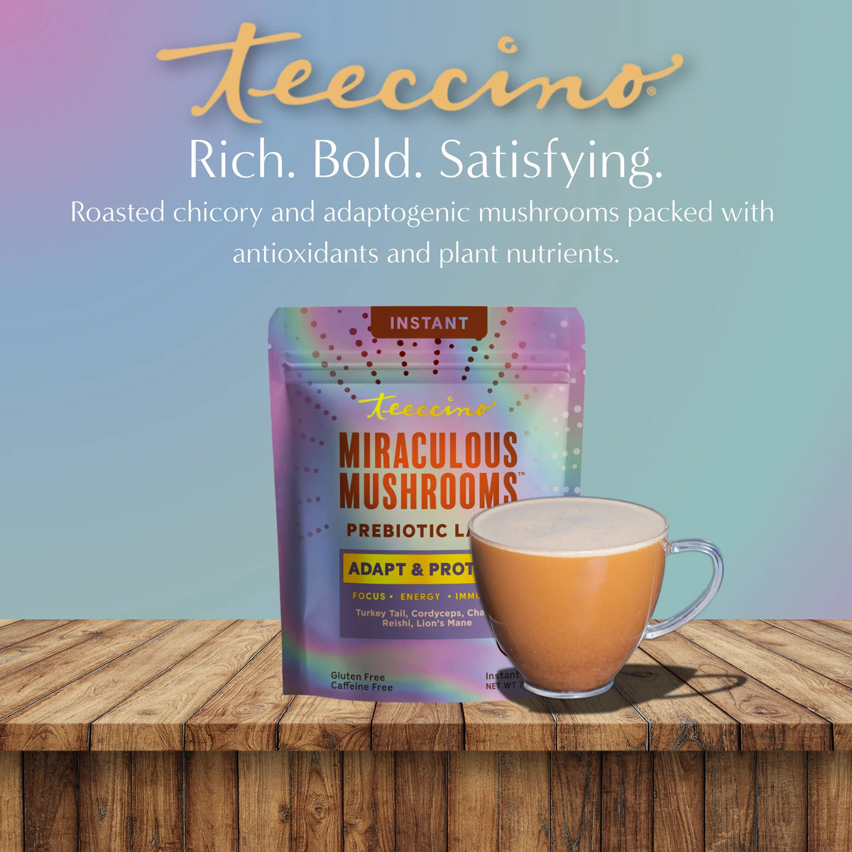 Teeccino Miraculous Mushrooms Adapt & Protect herbal latte in a cup with frothy top and latte flavor packaging in the background.