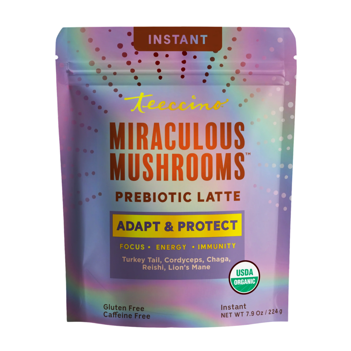 Teeccino Miraculous Mushrooms Adapt & Protect herbal latte in a cup with a spoon, showcasing the instant latte powder and packaging.