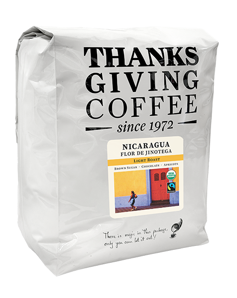 5lb bag of Nicaragua Flor de Jinotega FTO light roast coffee from Thanksgiving Coffee Company, showing the coffee bag with label.