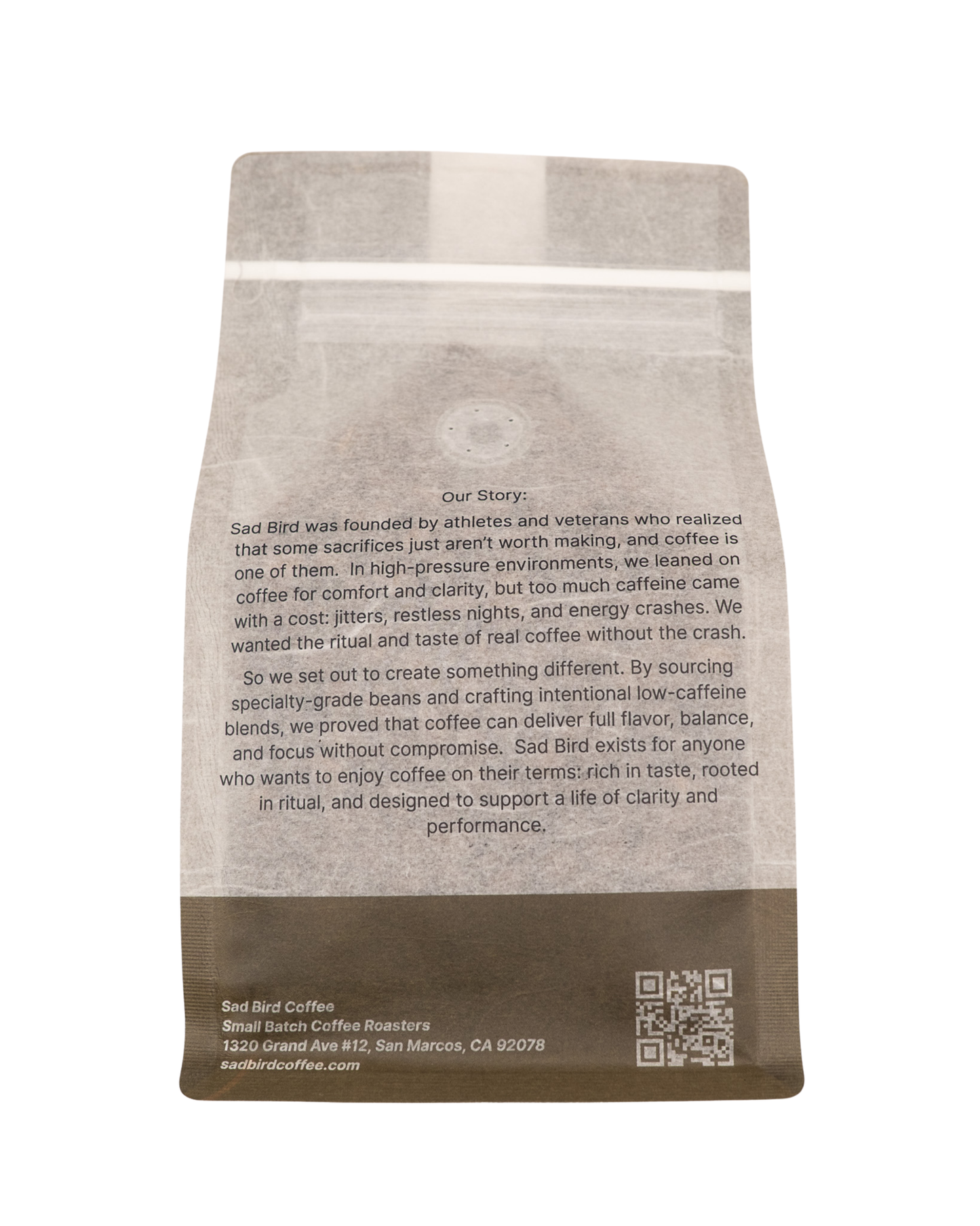 Sad Bird Coffee FIRST LIGHT Half Caff Medium Roast coffee bag with label, showcasing the product packaging and branding.