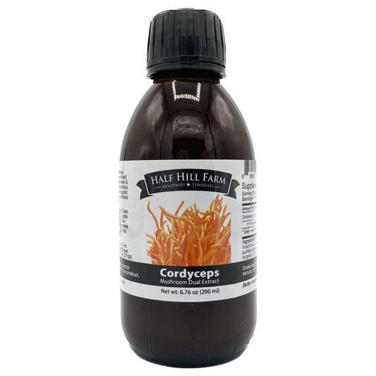 Herbal Cordyceps Mushroom Dual Extract bottle from Half Hill Farm, 200ml, showing the dark glass container with label.