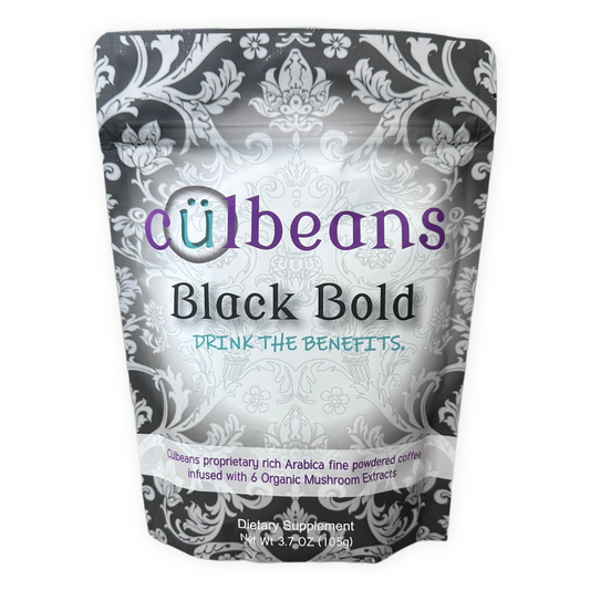 Cülbeans Arabica black coffee with a six-mushroom blend in a black cup, showcasing rich coffee and mushroom ingredients.
