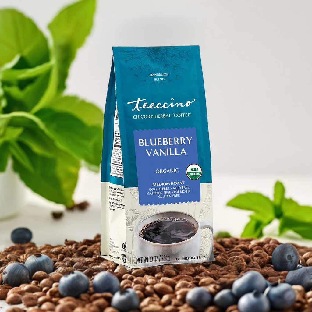 Blueberry vanilla chicory herbal coffee by Teeccino in a package with a scoop of brewed herbal coffee and fresh blueberries.