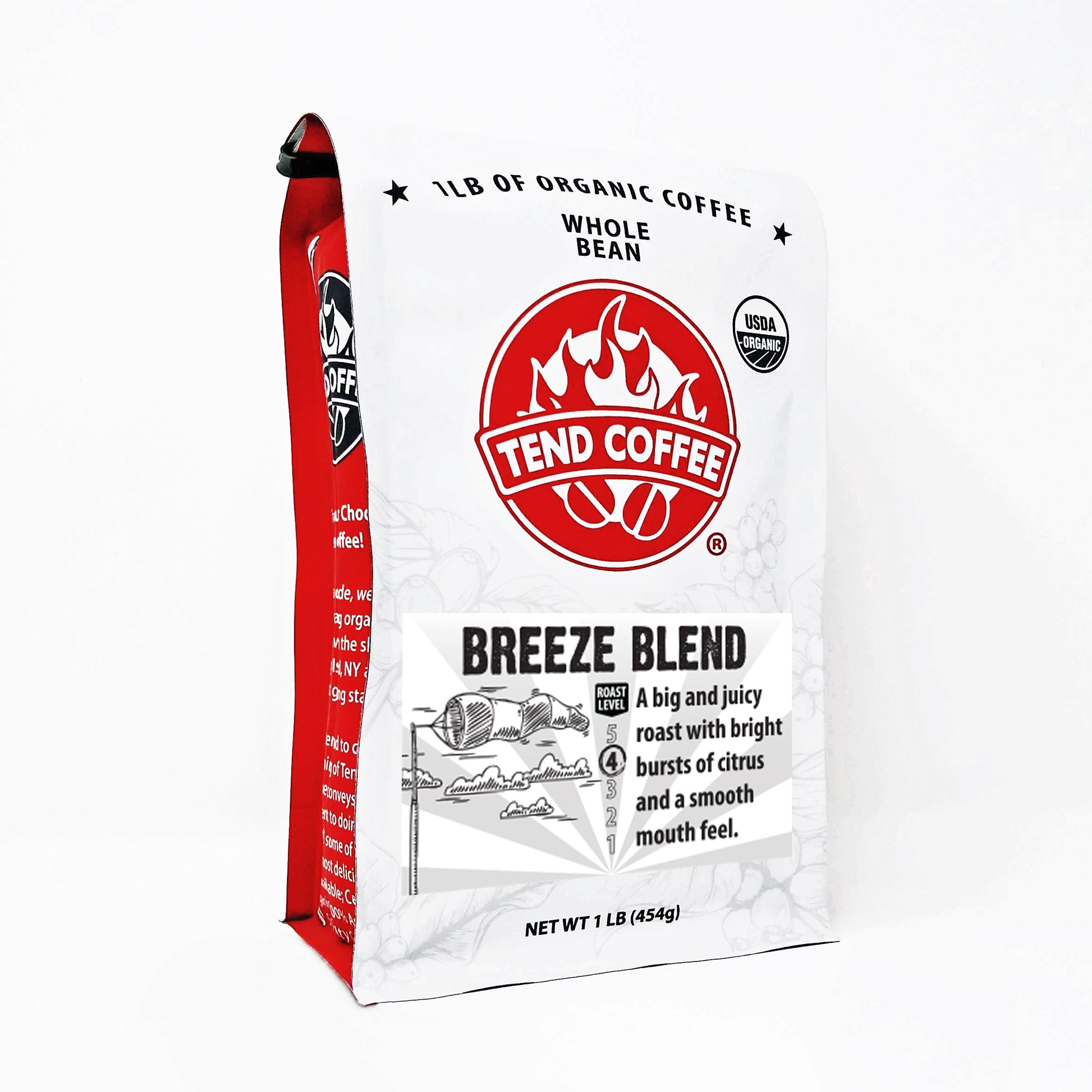 Breeze Blend coffee by Tend Coffee displayed in a clear glass with a steaming cup on a wooden table.