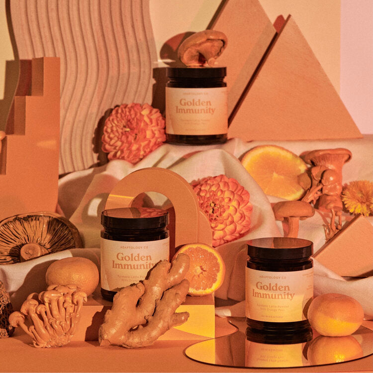 Golden Latte with Turmeric powdered beverage mix by a|dash, featuring a vibrant, golden-colored powder in a clear jar.