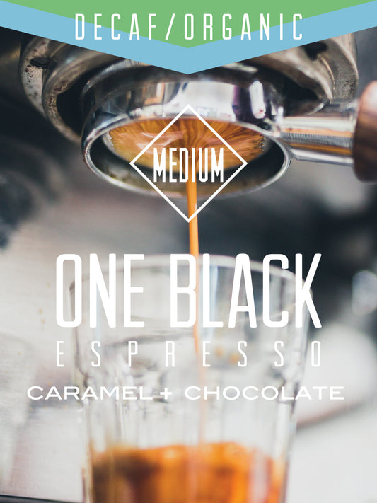 Decaf Organic One Black espresso coffee by Centri Coffee, showing a brewed cup with rich dark espresso and a crema layer.