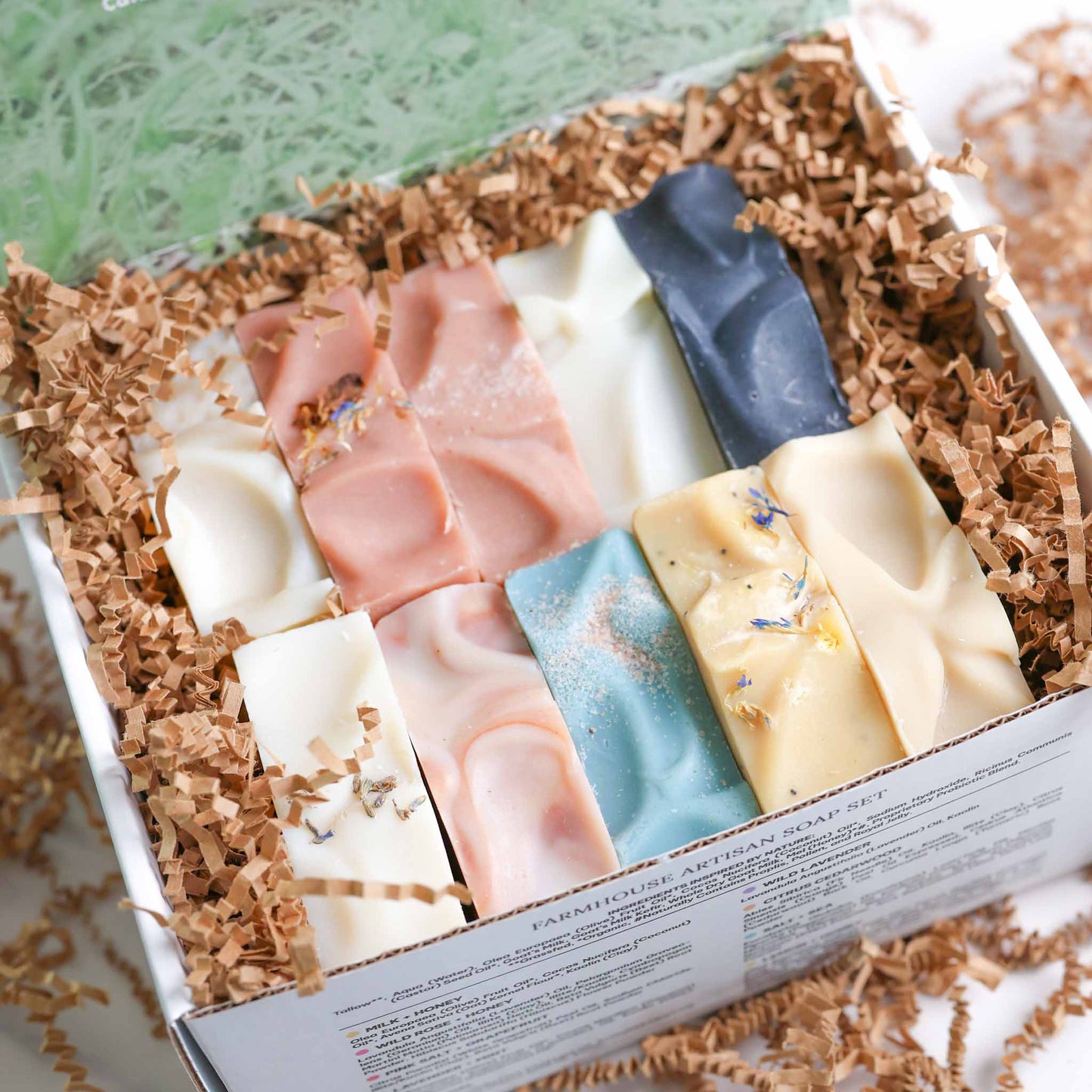 Farmhouse artisan goat milk and tallow soap collection by Pretty Farm Girl in a decorative box, featuring natural soap bars.