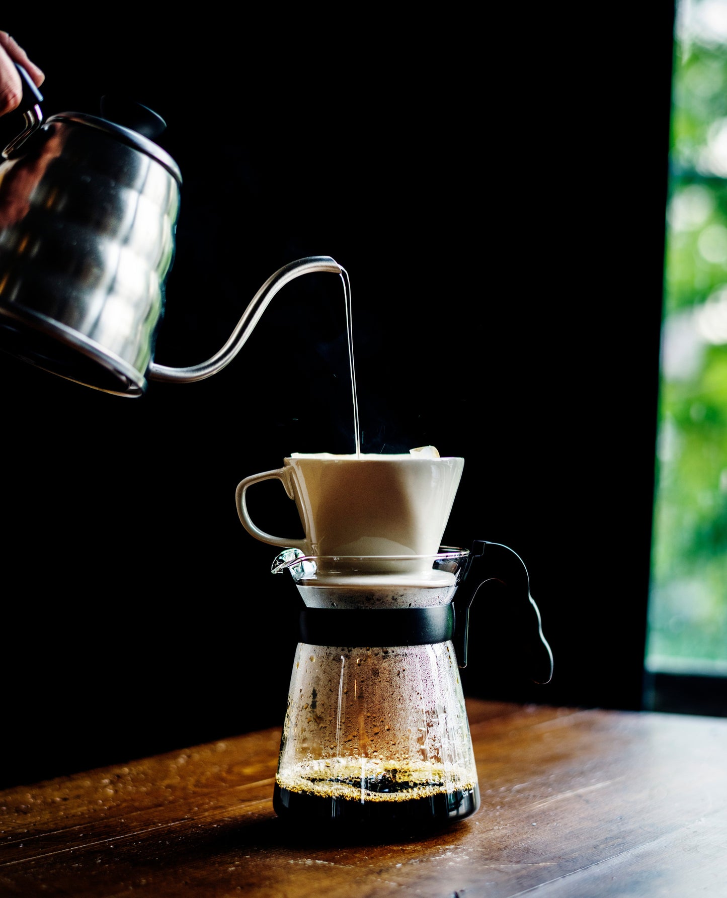 Single origin organic coffee from 42 Days Coffee, Mama's Wake Up Call light roast, shown in filter drip brewing process.