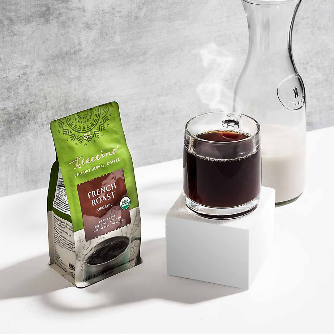 French Roast Chicory Herbal Coffee by Teeccino in a mug, showcasing rich dark color and herbal coffee blend.
