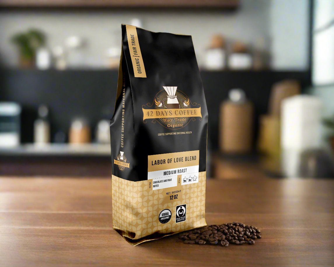 Front view of 42 Days Coffee Labor of Love Blend organic light roast coffee bag with label and branding.