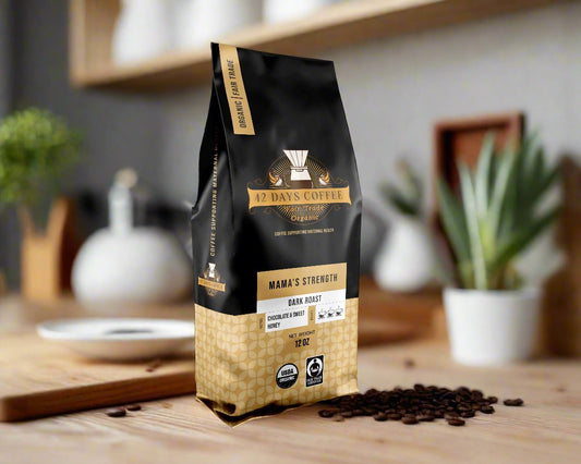 Front view of 42 Days Coffee's Mama's Strength organic dark roast coffee bag with bold branding and premium packaging.