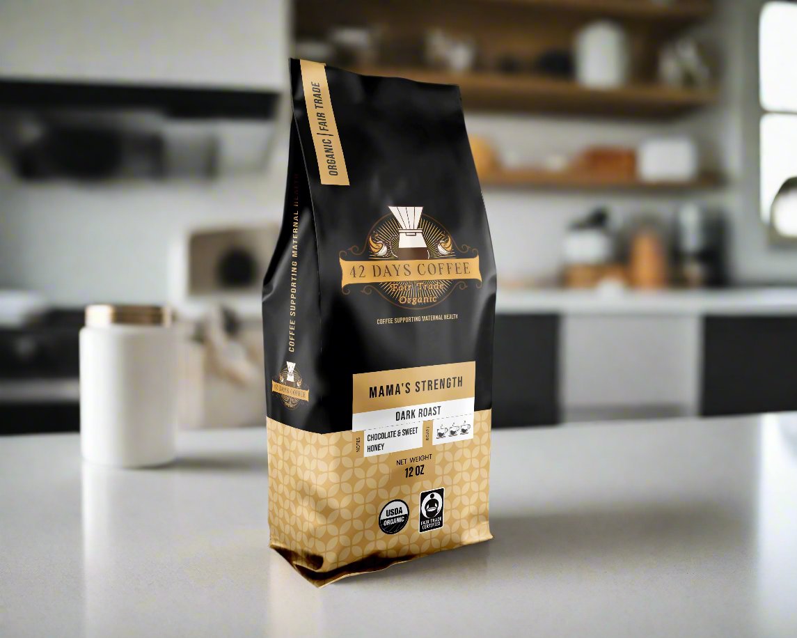 Front view of Mama's Strength Organic Dark Roast Coffee bag by 42 Days Coffee, featuring bold branding and dark roasted coffee beans.