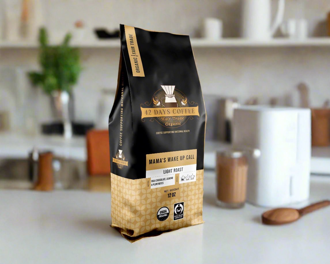 Front view of 42 Days Coffee Mama's Wake Up Call organic single origin light roast coffee bag with colorful label design.