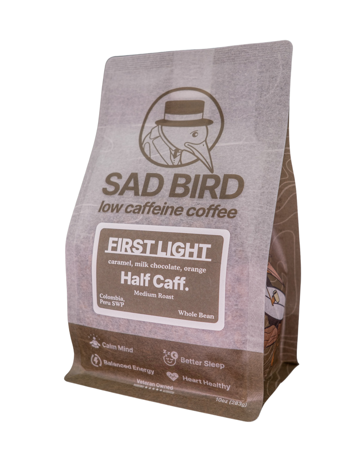 Sad Bird Coffee FIRST LIGHT Half Caff Medium Roast coffee bag with label featuring brown and beige tones.