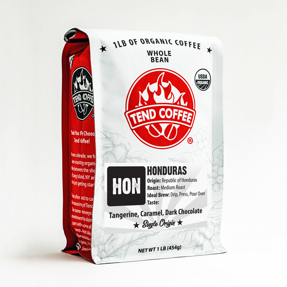 Fresh Honduras Tend Coffee 1lb bag, whole coffee beans with vibrant roasted surface and rich aroma.