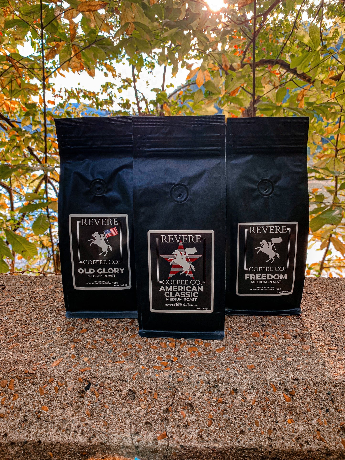 Medium roast coffee bundle by Revere Coffee Company featuring Freedom, Old Glory, and American Classic blends in a display.