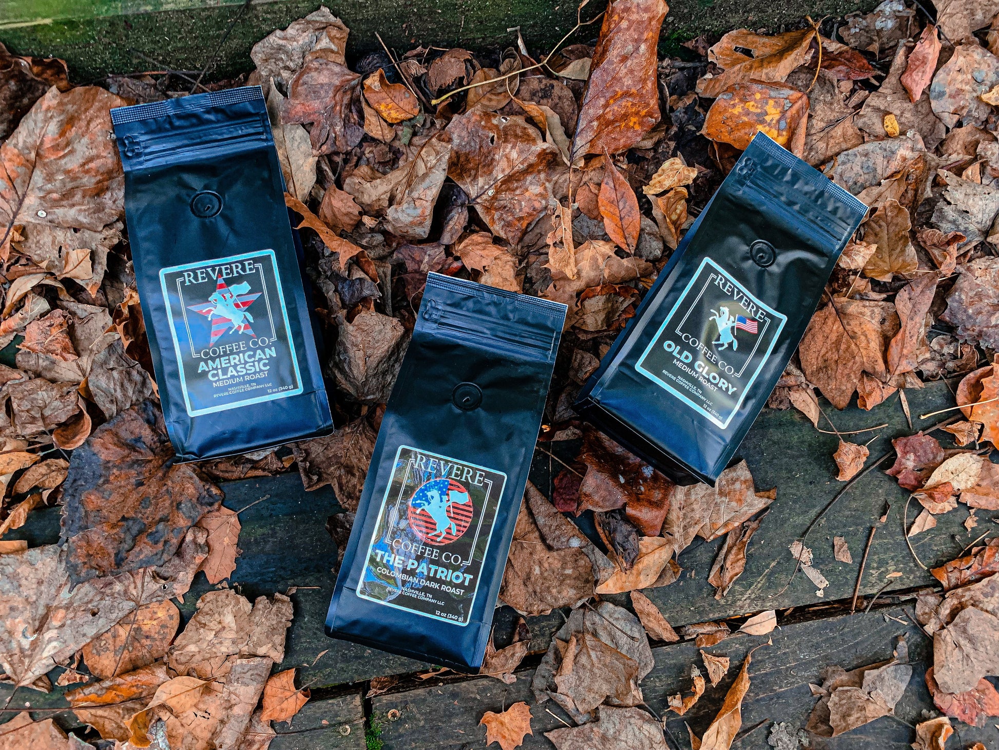 Revere Coffee Company American Bundle with Patriot, American Classic, and Old Glory coffee bags on a table.