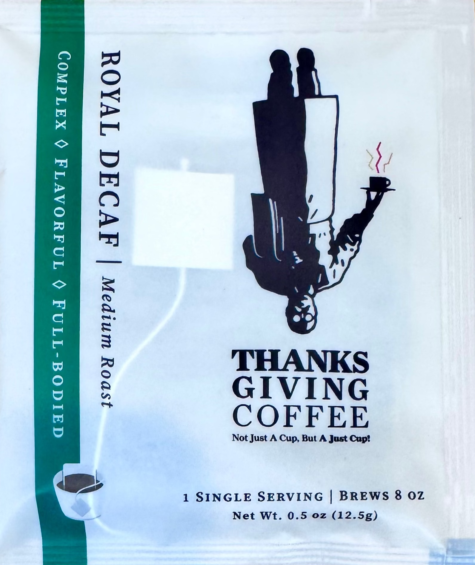 Royal Decaf pour-over coffee packet by Thanksgiving Coffee Company, medium roast, with coffee grounds visible in the image.