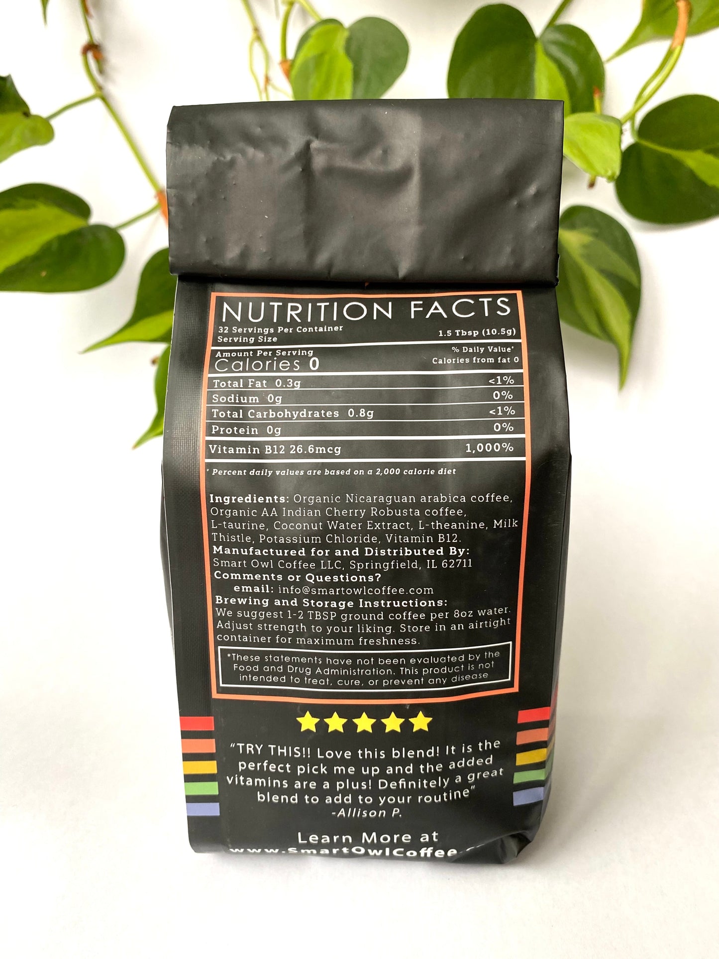 Smart Owl Coffee Recharge Blend detox coffee in a cup, showcasing rich brown coffee with a smooth surface and natural coffee beans.