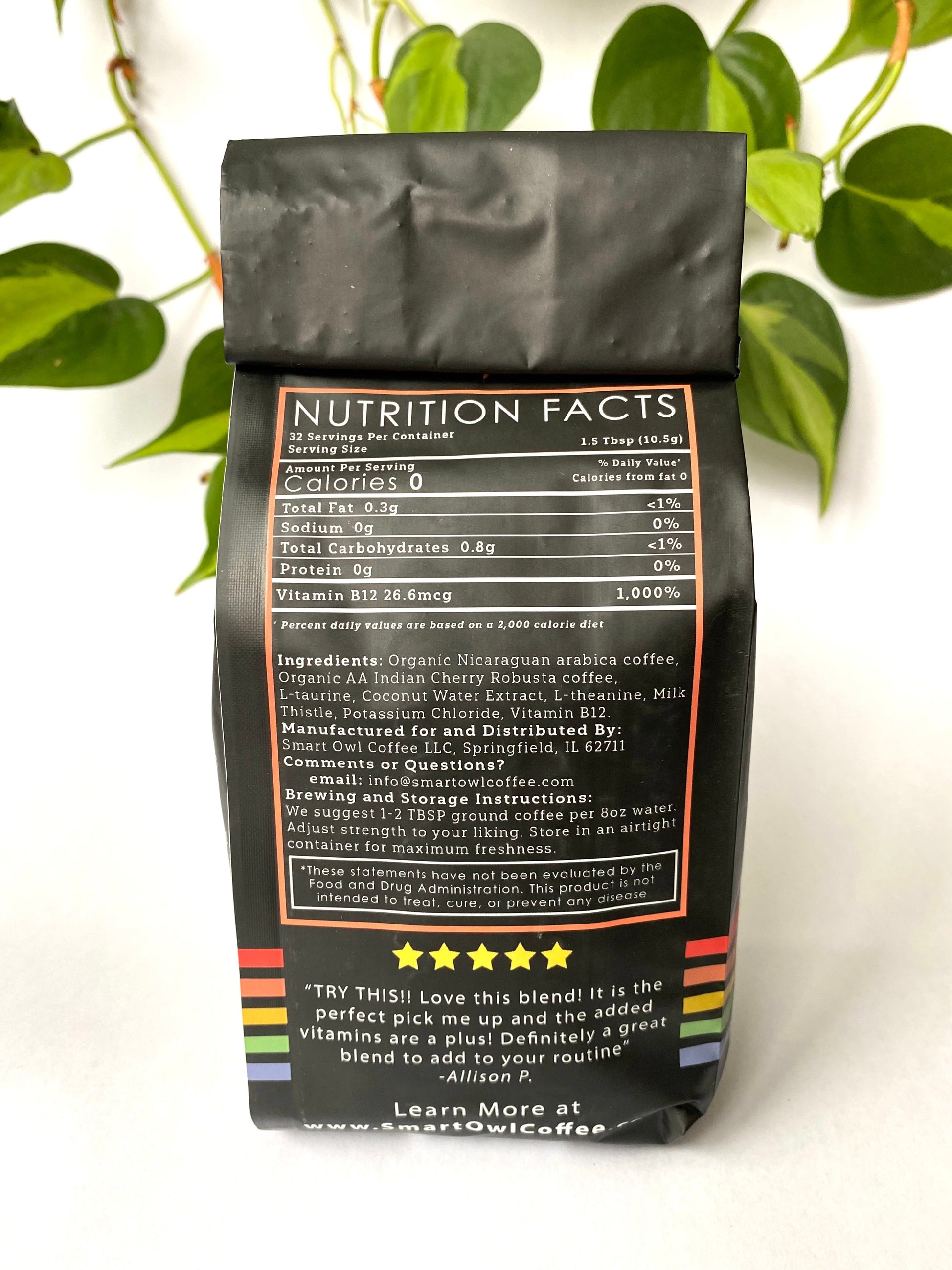 Smart Owl Coffee Recharge Blend detox coffee in a cup, showcasing rich brown coffee with a smooth surface and natural coffee beans.