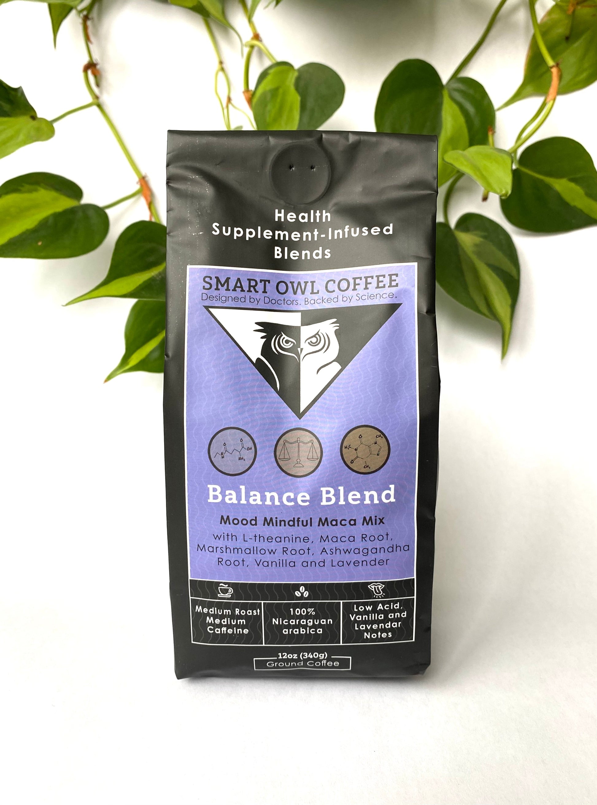 Smart Owl Coffee Balance Blend Vietnamese Lavender Coffee in a mug with lavender flowers and coffee beans, showcasing a calming, aromatic brew.