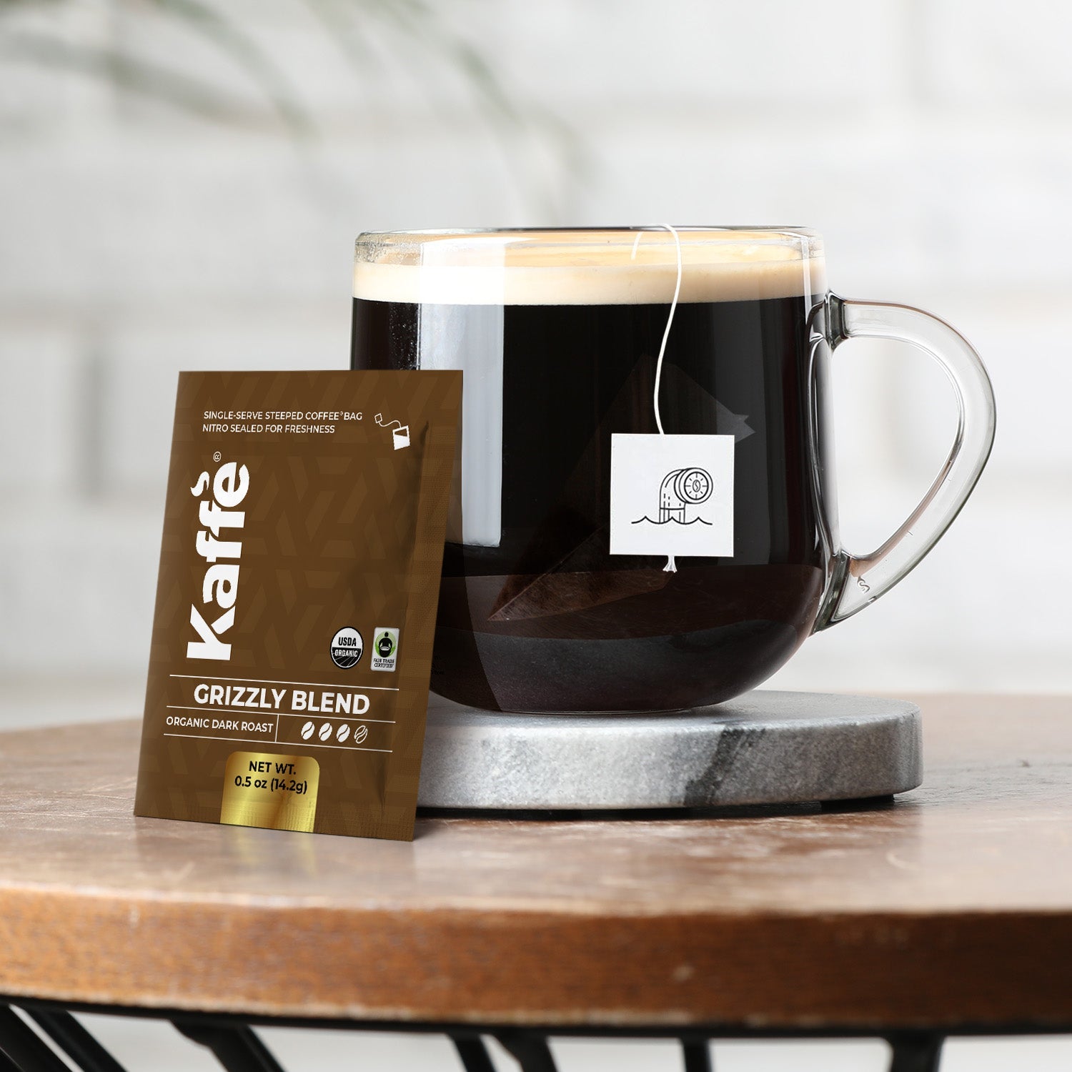 Kaffe Products Grizzly Blend dark roast coffee steeped bags, 5-pack, with coffee steeps and packaging visible.
