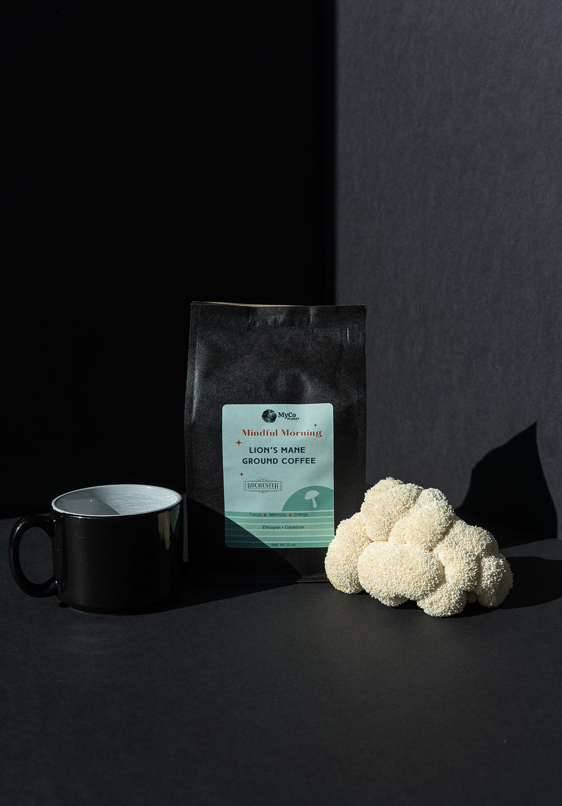 Ground Lion's Mane coffee from MyCo Planet, featuring a bag of Lion's Mane mushroom-infused coffee on a wooden surface.