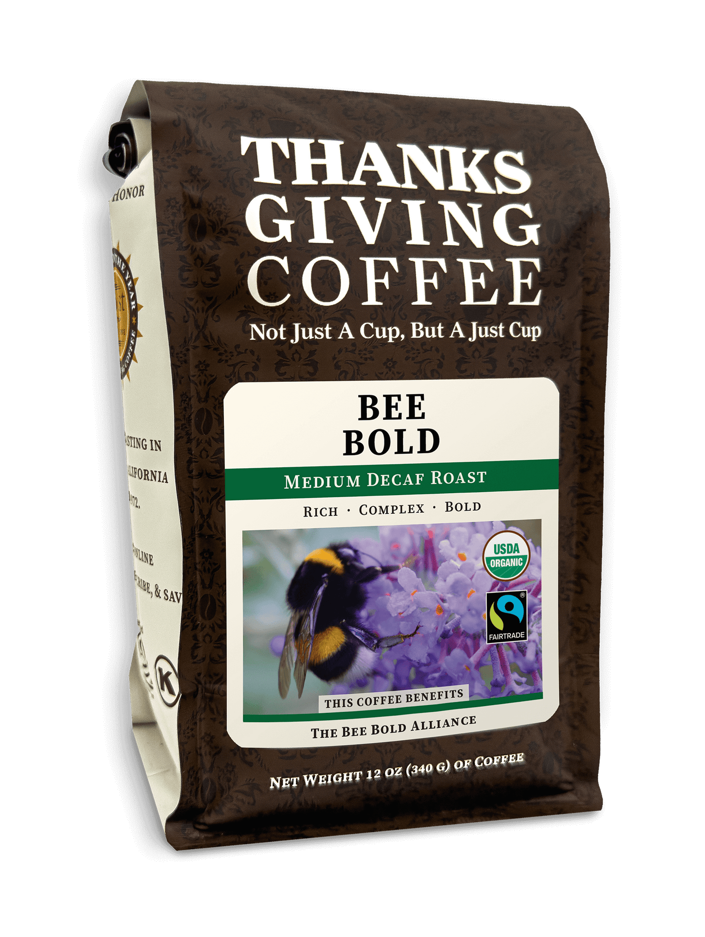 Thanksgiving Coffee Bee Bold Decaf FTO medium roast coffee package with a colorful label and bee illustration.