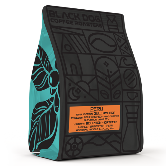 Single origin Peru coffee beans from Black Dog Coffee Roasters in a bag with a Peru-themed label and vibrant artwork.