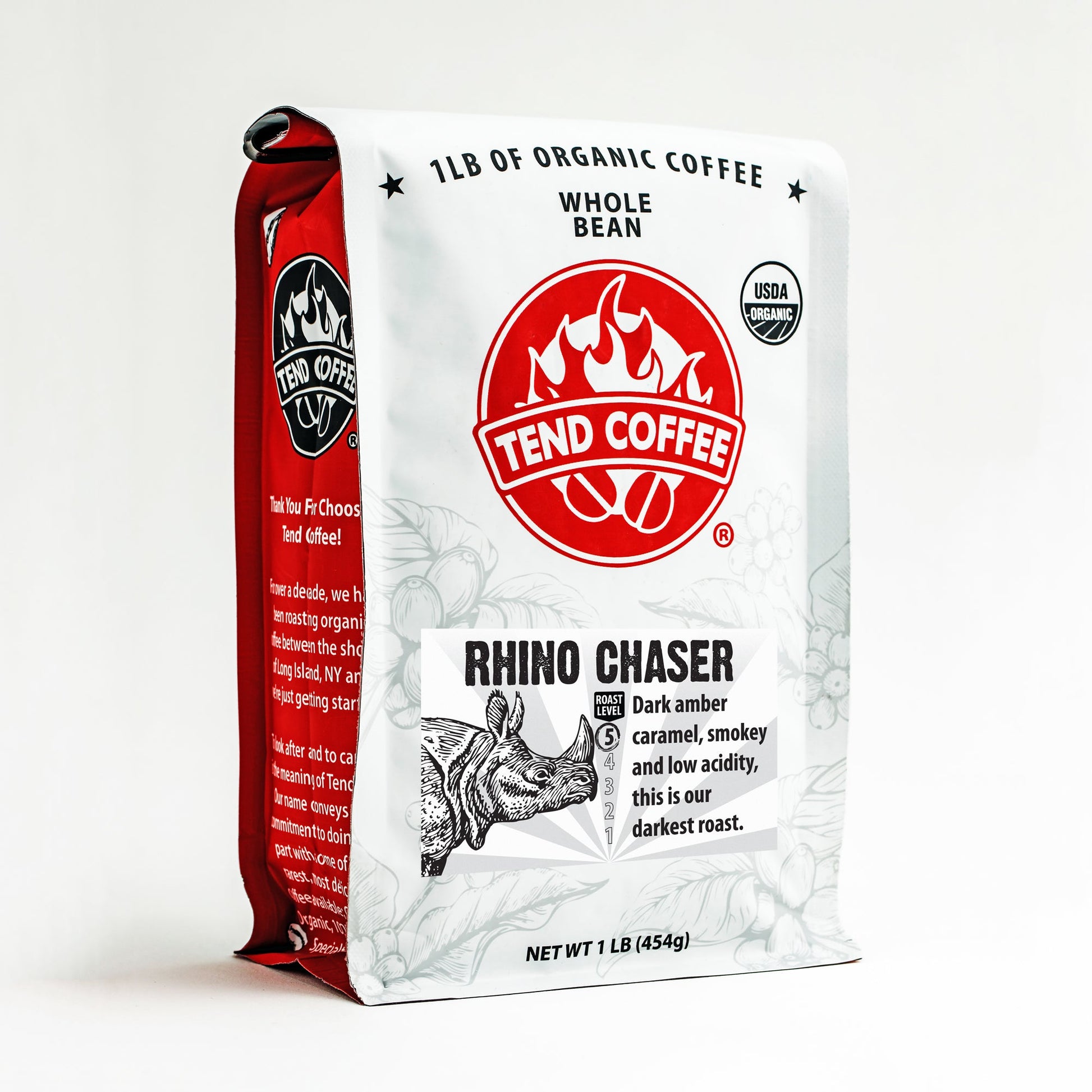 Front view of Tend Coffee Rhino Chaser coffee mug with a detailed Rhino design on a white ceramic surface.