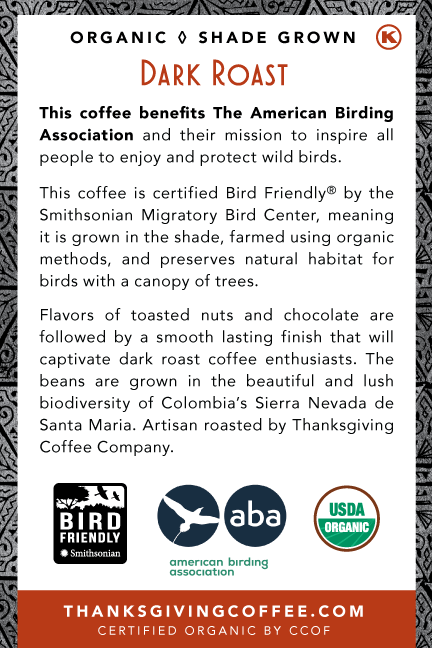 Dark roast SongBird Colombian coffee beans from Thanksgiving Coffee Company, shown in a back view image.