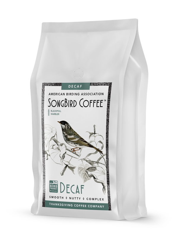 Decaf medium roast coffee bag from SongBird Decaf by Thanksgiving Coffee Company, featuring a balanced, rich coffee blend.