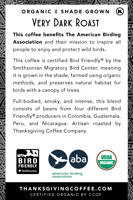 Back view of SongBird French Very Dark Roast coffee bag by Thanksgiving Coffee Company, showing dark packaging and branding.