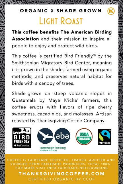 Back view of SongBird Guatemalan FTO light roast coffee bag by Thanksgiving Coffee Company, showing the packaging design.