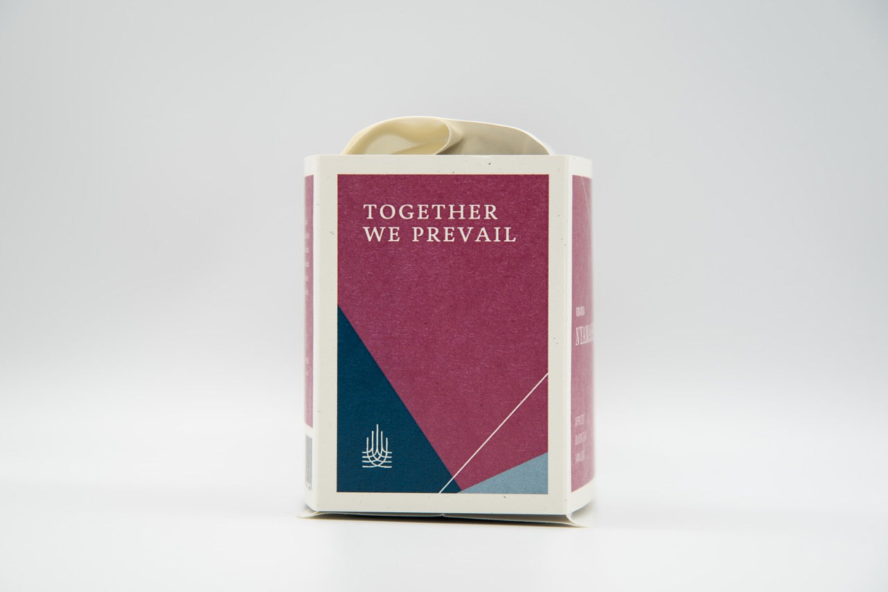 Prevail Coffee Rwanda Nyamasheke coffee beans in a bag, showcasing fresh roasted coffee for brewing.