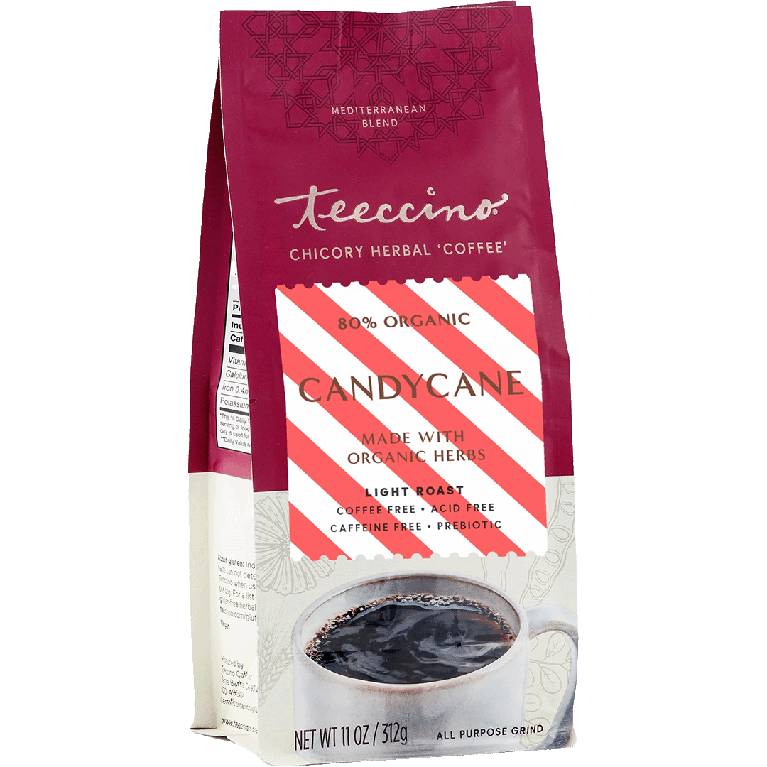 Teeccino Candy Cane Chicory Herbal Coffee in a clear glass mug with candy cane garnish, showcasing festive herbal coffee.