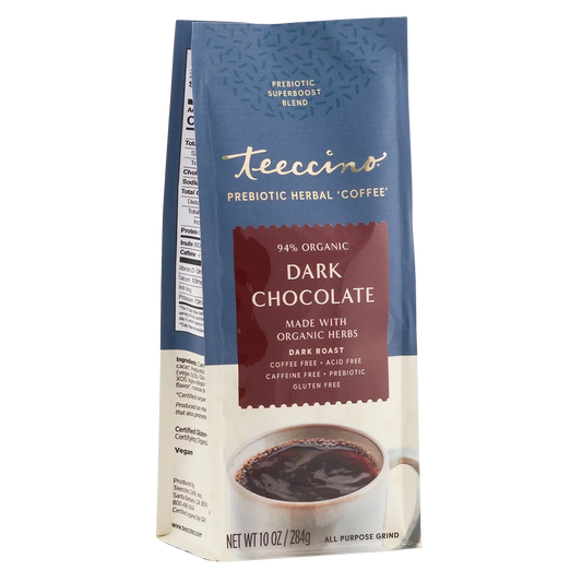 Front view of Teeccino Dark Chocolate Prebiotic Herbal Coffee in a glass mug, showcasing its rich dark chocolate color and herbal infusion.