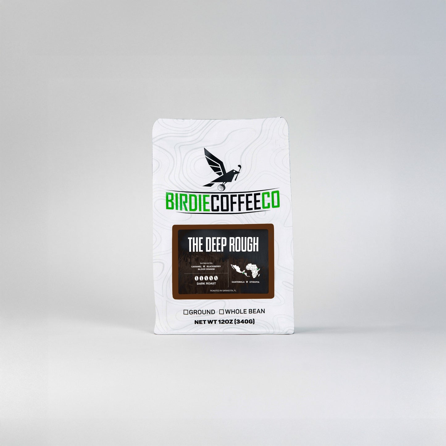 Dark roast coffee beans from Birdie Coffee Company's The Deep Rough blend, showcasing whole, rich, and aromatic coffee beans.