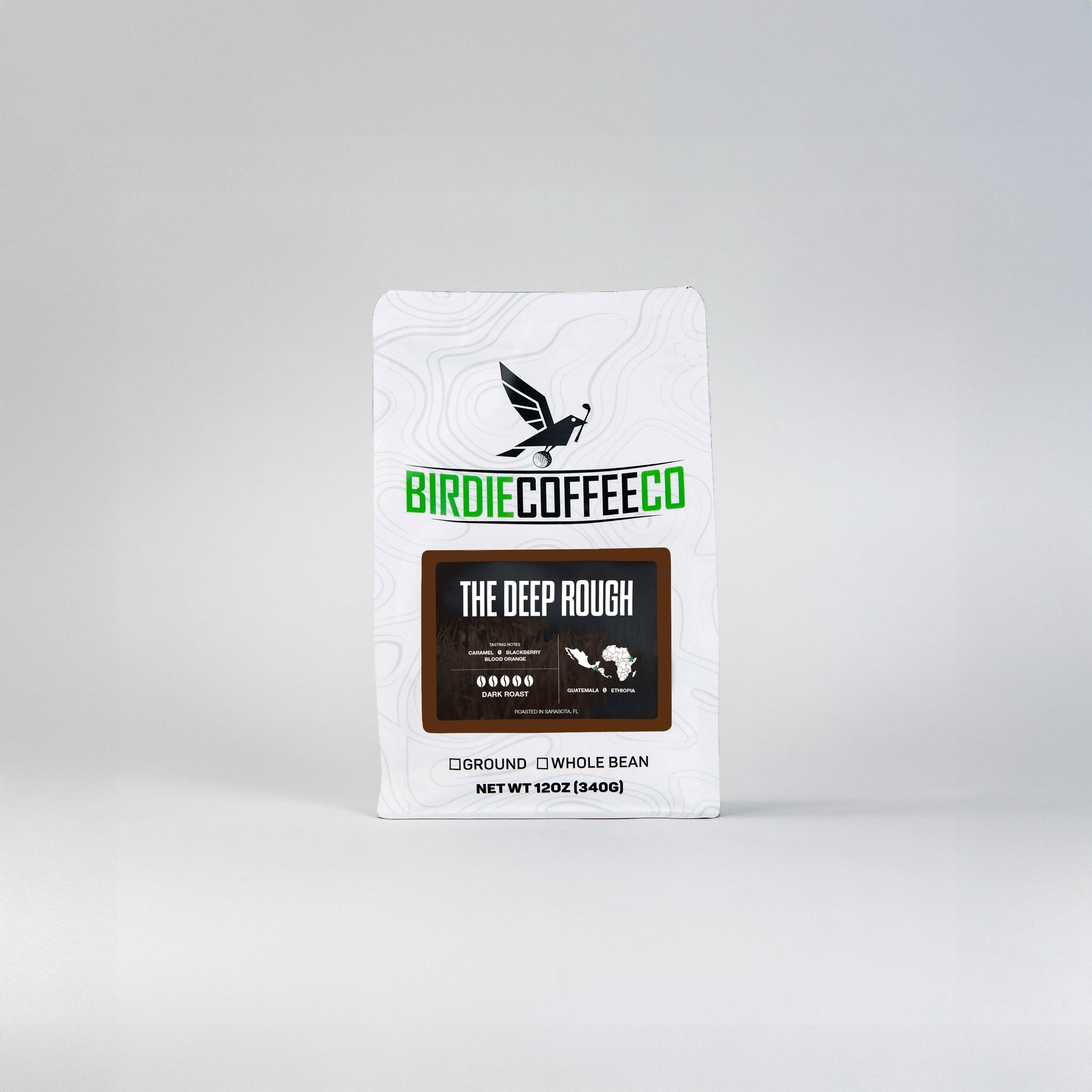 Dark roast coffee beans from Birdie Coffee Company's The Deep Rough blend, showcasing whole, rich, and aromatic coffee beans.