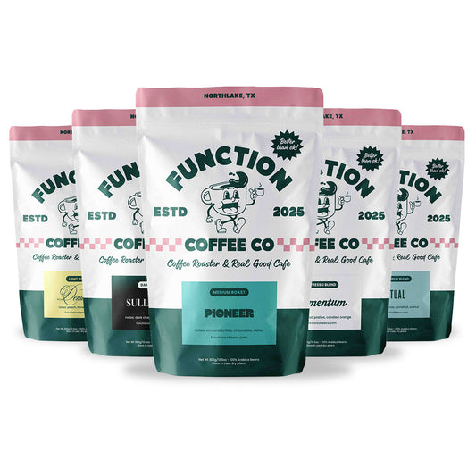Assorted bags of Whole Bean and Ground Coffee from Function Coffee Co in The Founder's Box bundle.