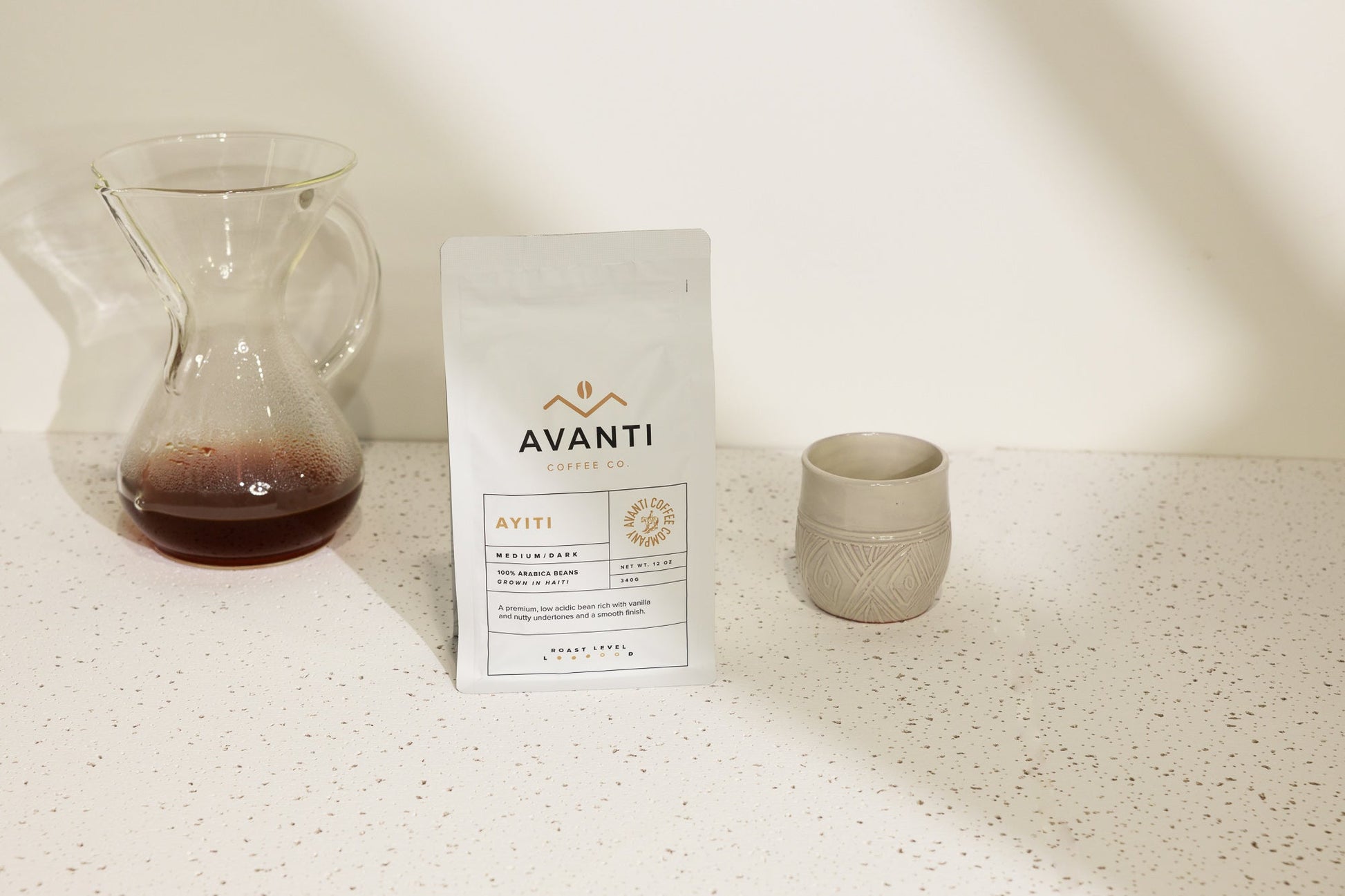 Medium roast coffee from Avanti Coffee Company, showcasing a fresh bag of Ayiti-Medium Roast coffee beans.